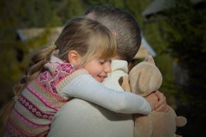 daughter hugging father