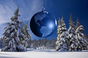 Globe, snow and pine trees