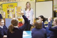 Teacher and children in classroom